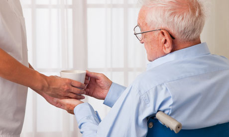 elderly man in a wheelchair in care homecare home residential care